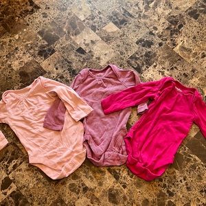 NWOT Long sleeved onesies.